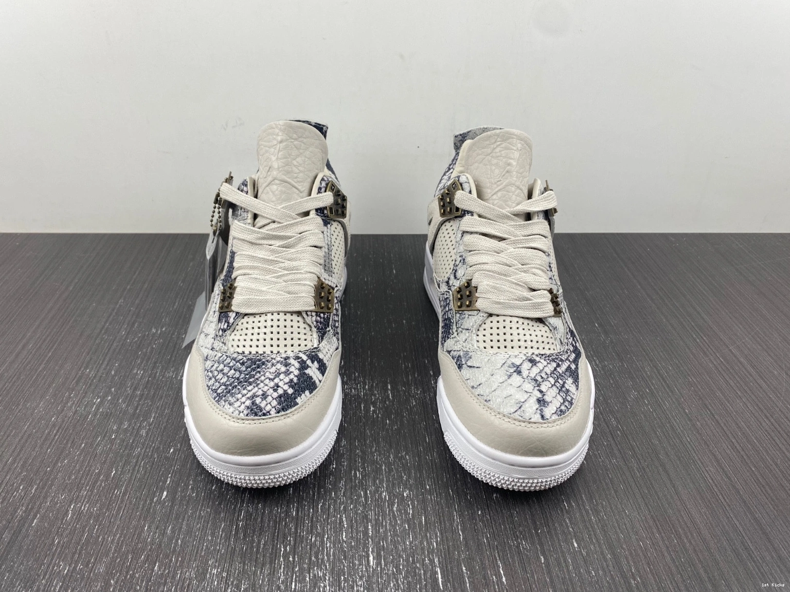 - 819139-030 Retro Snakeskin Jordan 4 1225